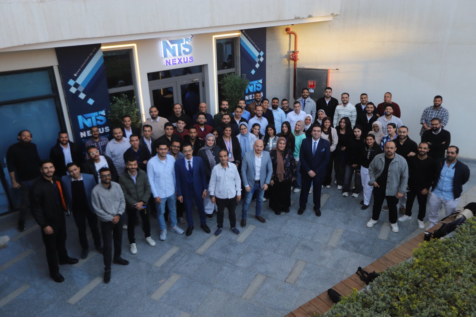 The NTS team outside their Cairo office